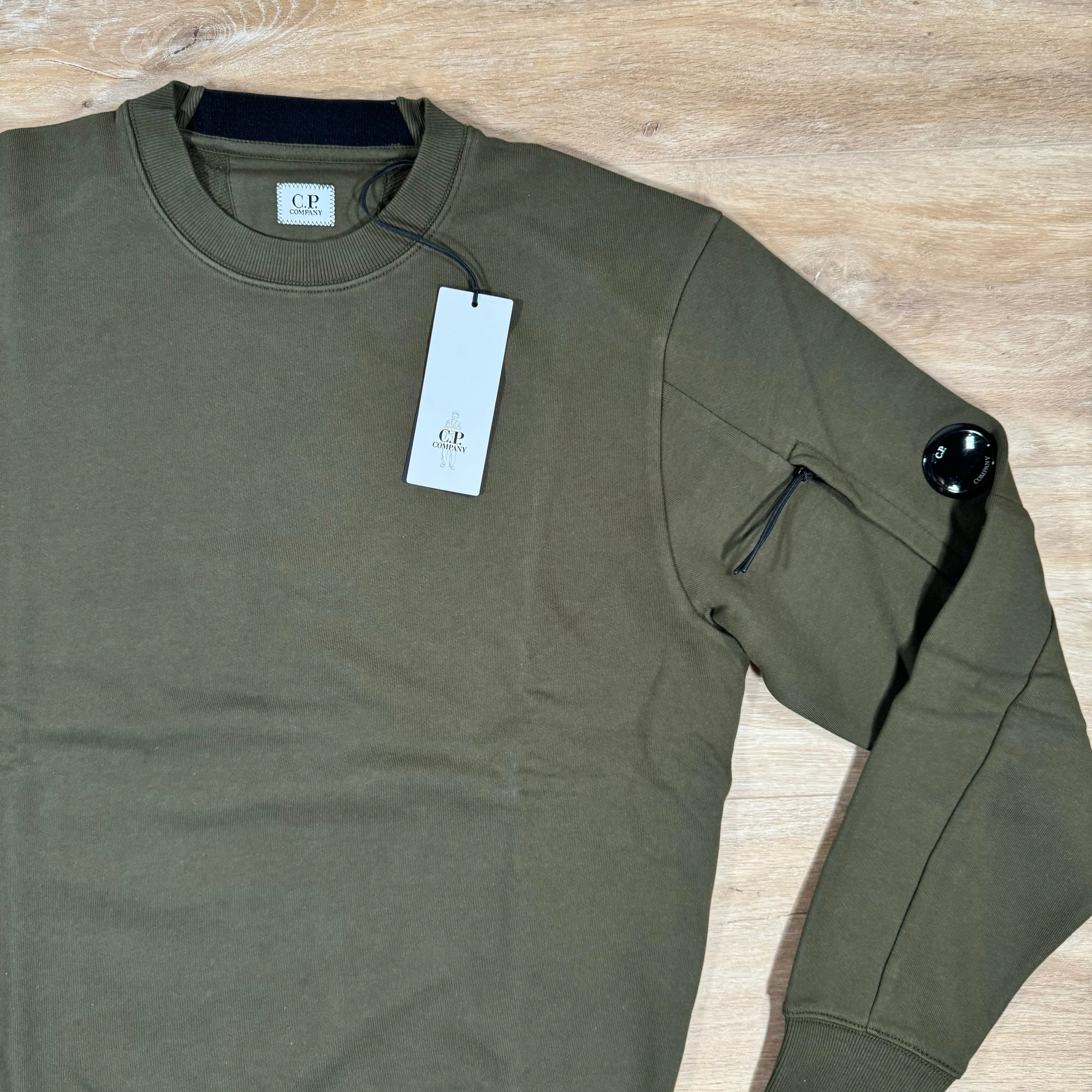 C.P. Company Diagonal Raised Fleece Crewneck Lens Sweatshirt in Ivy Green - Image 2