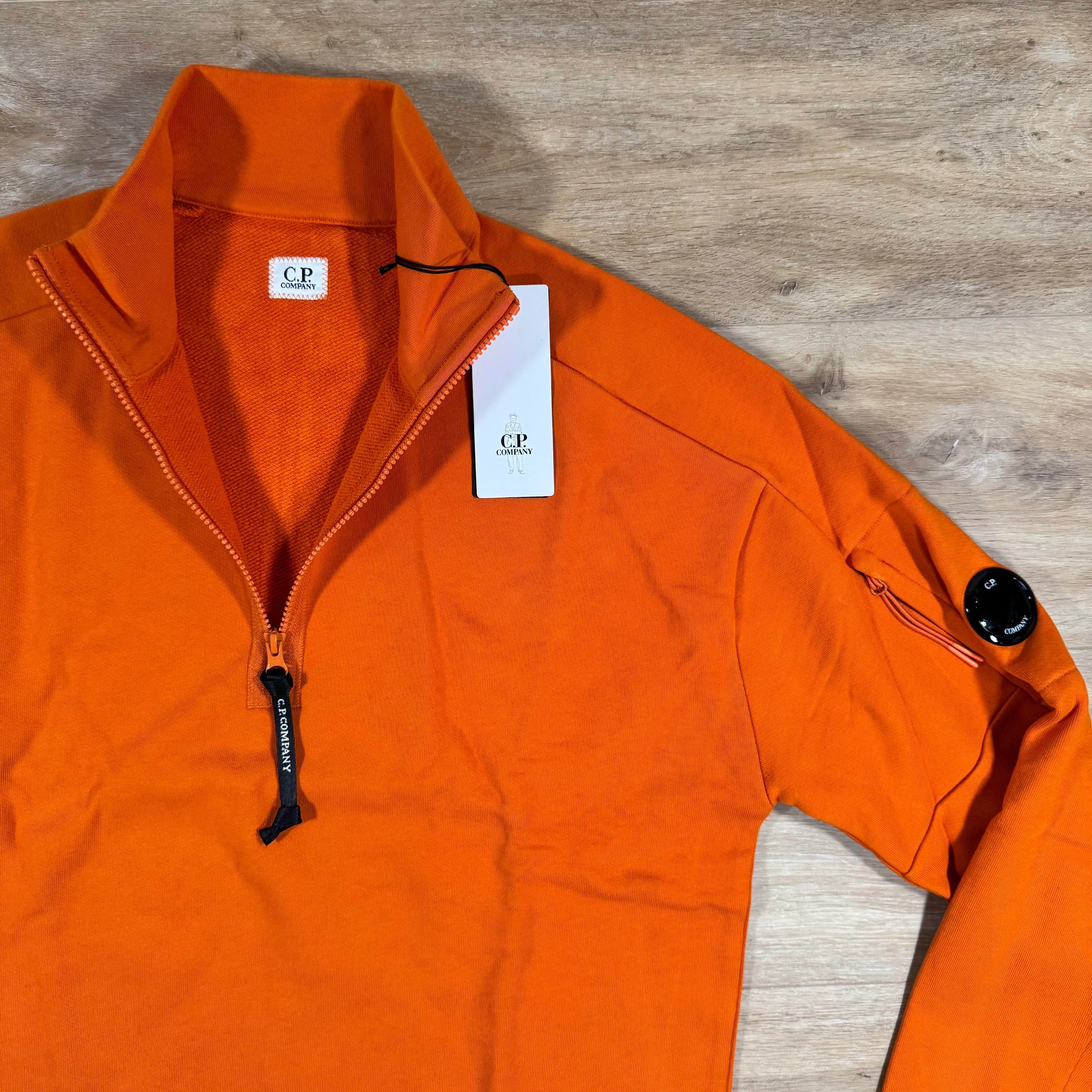 C.P. Company Diagonal Raised Half-Zip Lens Sweatshirt in Russet Orange - Image 2