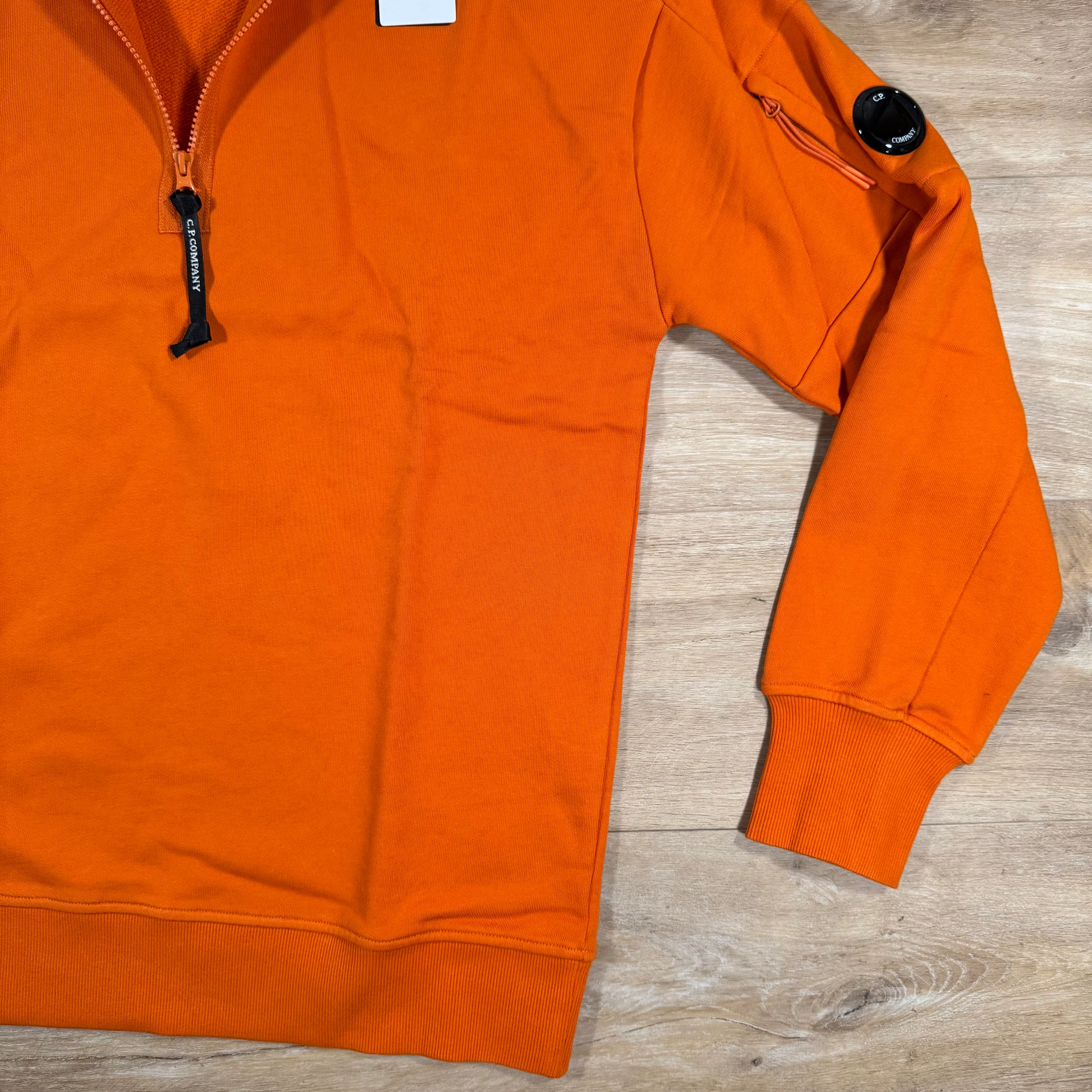 C.P. Company Diagonal Raised Half-Zip Lens Sweatshirt in Russet Orange - Image 3
