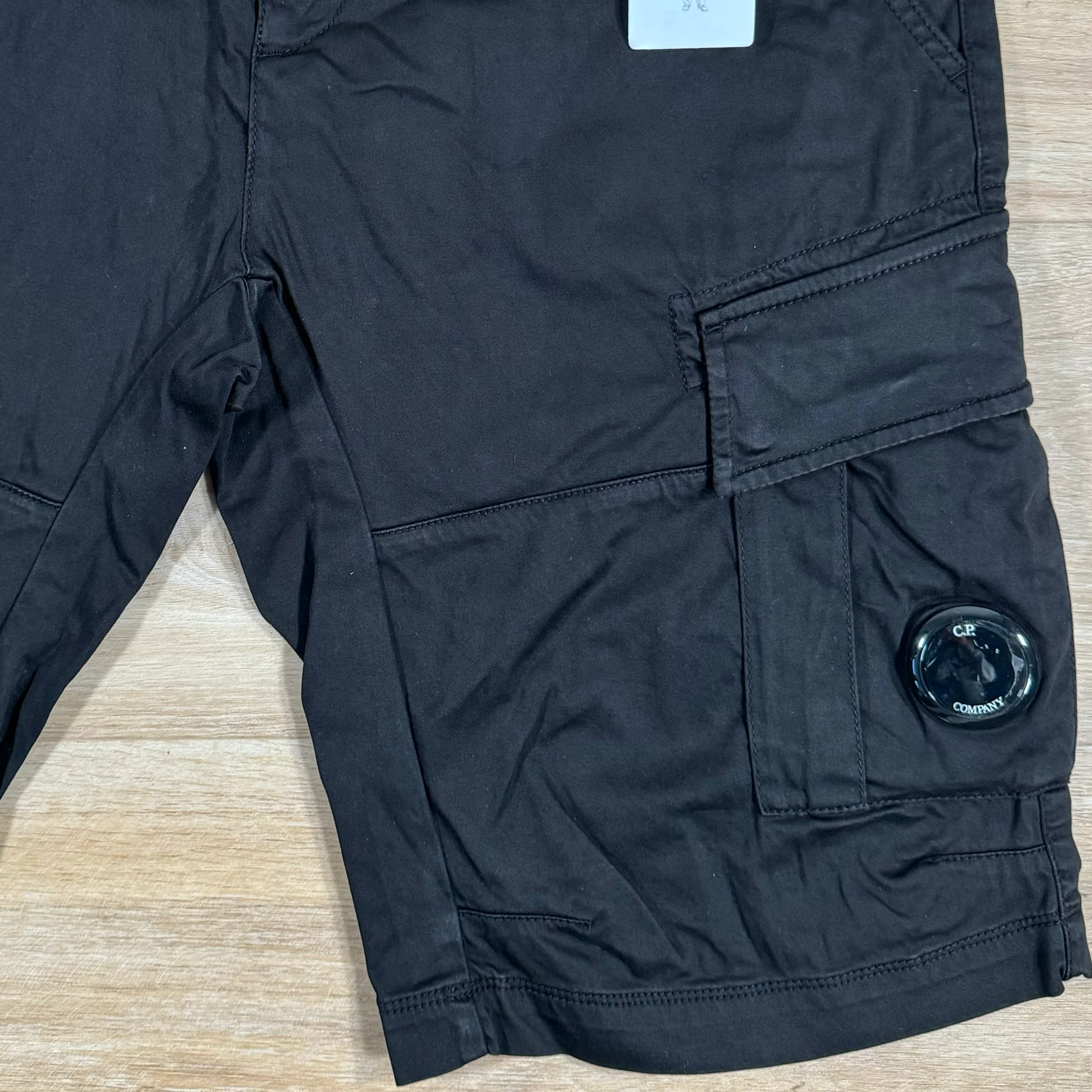 C.P. Company Stretch Sateen Cargo Lens Shorts in Black - Image 3